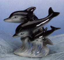 Image of PORC. TRIPLE DOLPHINS ON WAVES