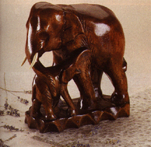 Image of WOOD MAMA  BABY ELEPHANT