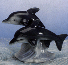 Image of PORC. DOLPHINS ON WAVE