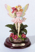 Image of ALAB FAIRY HOLDING FLOWERS