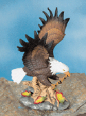 Image of PORC EAGLE ON STUMP WLEAVES