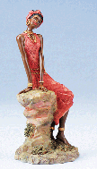 Image of ALAB. AFRICAN LADY ON STONE