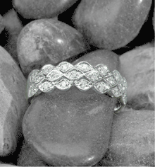 Image of 18K WHITE GOLD LADYS DIA RING - Size 05